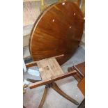 A 1.25m diameter Georgian style mahogany tilt-top breakfast table, set on turned pillar and