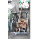 A crate containing a quantity of assorted tools and metalware including a Victorian table winder and
