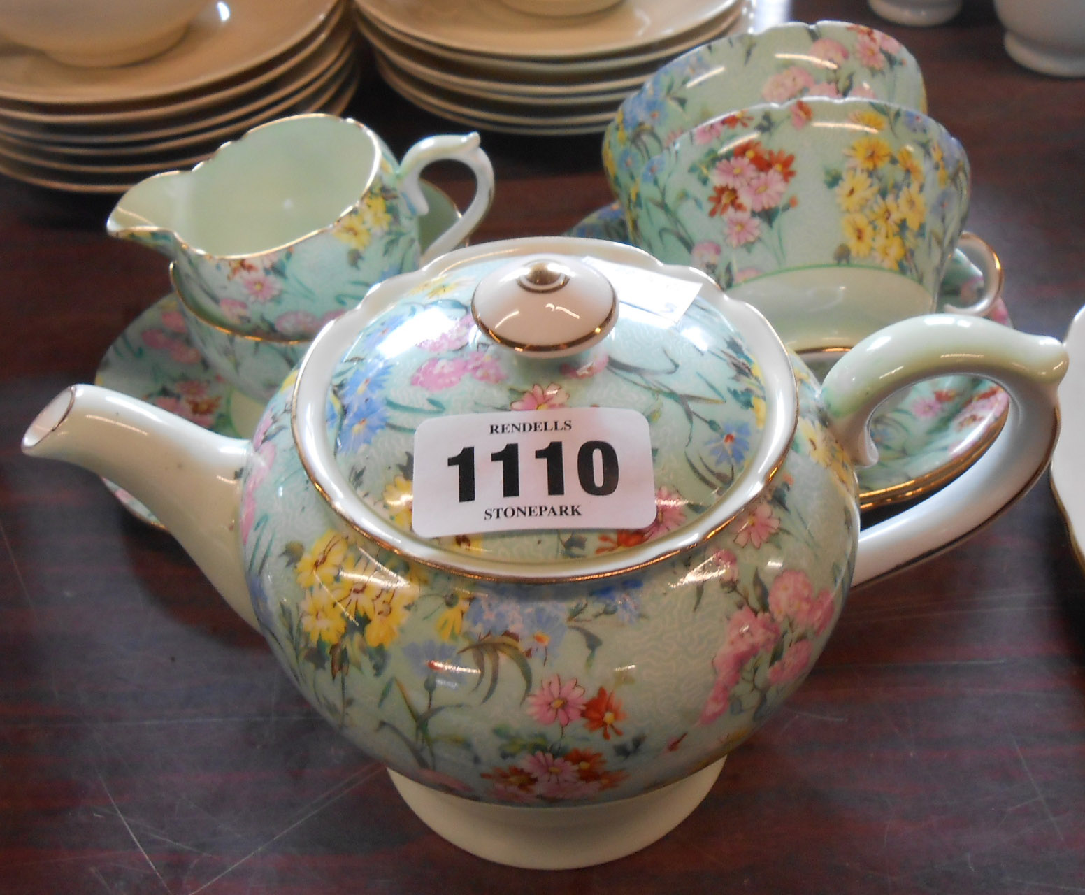 An Art Deco Shelley bone china Melody pattern Tea for Two set comprising teapot, milk and sugar, two