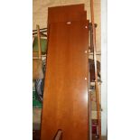 A large Stag mahogany wardrobe with hanging space enclosed by two doors