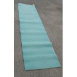 A Wilton machine made turquoise runner
