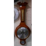 A small stained wood cased Weathermaster banjo barometer/thermometer with visible aneroid works