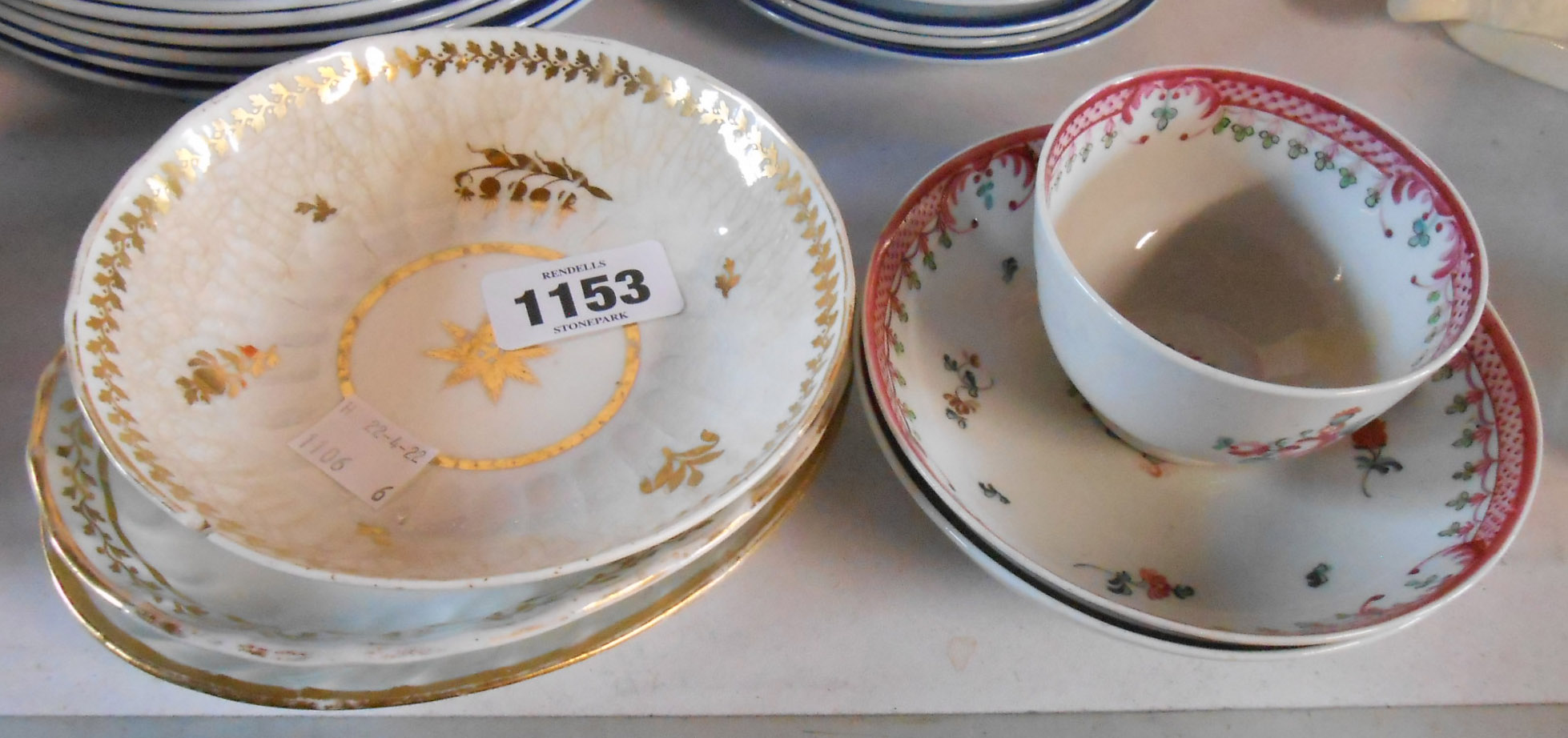 An 18th Century Newhall tea bowl and two saucers - sold with three early 19th Century gilt decorated