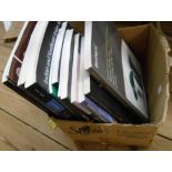 A box containing a collection of antiques catalogues including Bonhams, Sothebys and others
