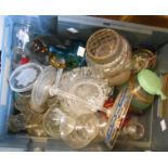 A crate containing a quantity of assorted glassware including coloured glass, paperweights, etc.