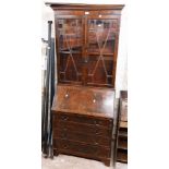 A 76cm reproduction mahogany and cross banded two part bureau/bookcase with astragal glazed top