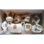 A box containing a small quantity of crested china