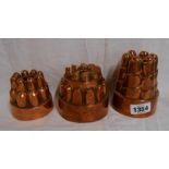Three small Victorian jelly moulds of castellated form, one marked for Benham & Froud