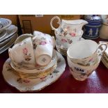 A vintage Duchess bone china part tea set comprising five trios, one large cup and saucer, milk