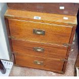 A 41cm reproduction brass bound mixed wood campaign style chest of three drawers with flush brass