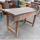 An old pine workshop bench of plank construction, fitted with a Record No.3 vice