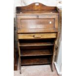 A 54cm early 20th Century stained oak student's bureau with part fitted interior, drawer and open