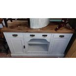 A 1.5m Edwardian later white painted walnut sideboard with added top, three frieze drawers,
