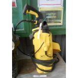 A Karcher K2 pressure washer with attachments