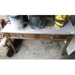 An old mixed wood side table with two frieze drawers - unpolished condition