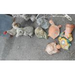 A quantity of concrete and terracotta garden statues including cockerel, pig, tortoises - sold