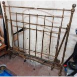 A 1.3m old brass double bedstead - no side rails and other parts missing