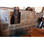 Two sections of old oak panelling, one with incised text 'This Panelling, Altar Table & Rails Are