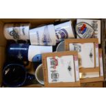 A box containing a quantity of Morgan car related ceramic mugs and coasters