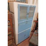 A 90cm mid 20th Century powder blue and white painted mixed wood kitchen unit with pair of glazed