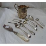 A small quantity of antique silver mustard and salt spoons, scimitar pattern butter knife and