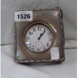 A silver mounted travelling pocket watch stand/case containing a silver plated cased Goliath