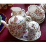 A Mintons Haddon Hall part Tea for Two set comprising teapot (a/f), milk and sugar, small preserve