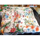 A vintage Gucci silk scarf with central print depicting snakes amongst flowers