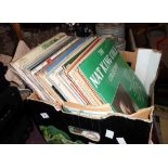 A box containing a quantity of mainly easy listening LP records