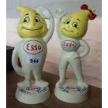 A pair of modern painted cast iron figures Mr and Mrs Esso figural money boxes