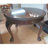 A 75cm diameter early 20th Century mahogany low table with piecrust edge, set on acanthus cabriole