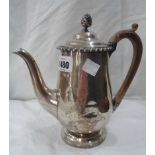 A silver coffee pot with hinged lid and gadrooned rim - damaged wood handle and dents
