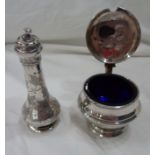 A silver mustard pot with hinged flip-lid and blue glass liner - sold with a silver pepperette of