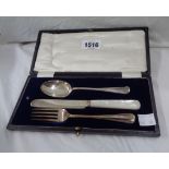 A cased Sheffield silver harlequin knife, fork and spoon christening set - fork and spoon with