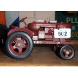 A modern tin plate model of a tractor