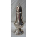 A silver sugar caster of baluster form with loaded circular foot - Birmingham, 1910