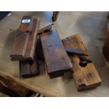 Four antique wooden moulding planes including Greenslades, Atkin, etc.