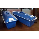 A pair of Le Creuset cast iron and enamel lidded serving dishes in the blue colourway