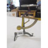 An antique French postal scale of candlestick form