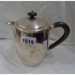 A silver hot water jug with push-fit lid, wooden knop and handle - marked for retailer Rowell of