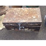 An old japanned trunk with painted name H.G Hedley