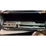 A John Packer JP111 flute in hard case with soft outer cover