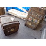 Two vintage canvas trunks with applied luggage labels for the Elder Dempster Line