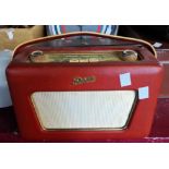 A vintage Roberts R500 portable transistor radio with red leatherette case
