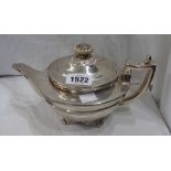 A silver teapot with ornate cast floral shell pattern base - London, 1806