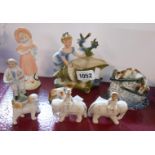 A quantity of continental porcelain figurines of various size and design