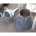A vintage galvanised watering can - sold with a stainless steel milk churn (no lid)