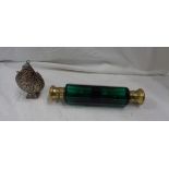 A brass capped green glass double ended scent bottle - sold with a decorative Eastern white metal