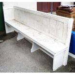 A 2.17m Victorian pine church pew with later painted finish with one corner end