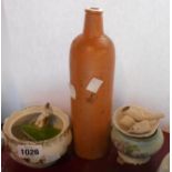 A small selection of ceramic items including old stoneware bottle, clay pipe bowls, Wade Whimsie,